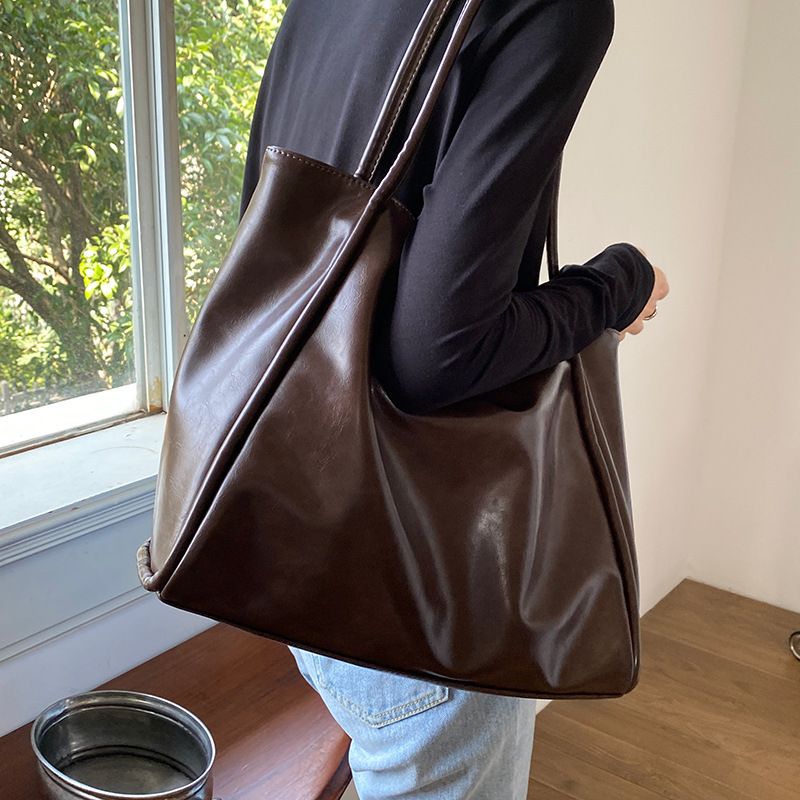 2025 New Women's Soft Leather Large Capacity Tote Handbag Niche Shoulder Underarm Bag For Class And Commute_voghion.com