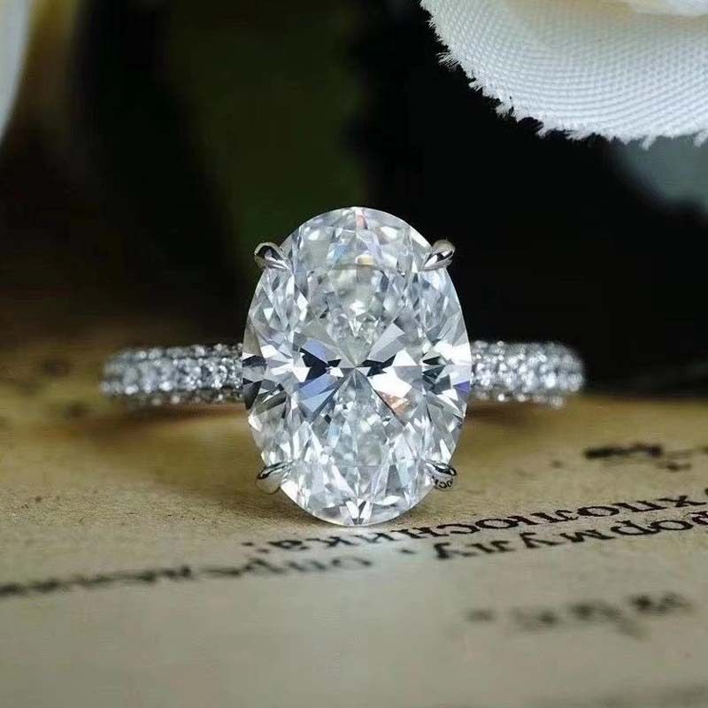 Elliptical simulation, exaggerated big pigeon egg simulation women's micro set crown, zircon large diamond ring, closed_voghion.com