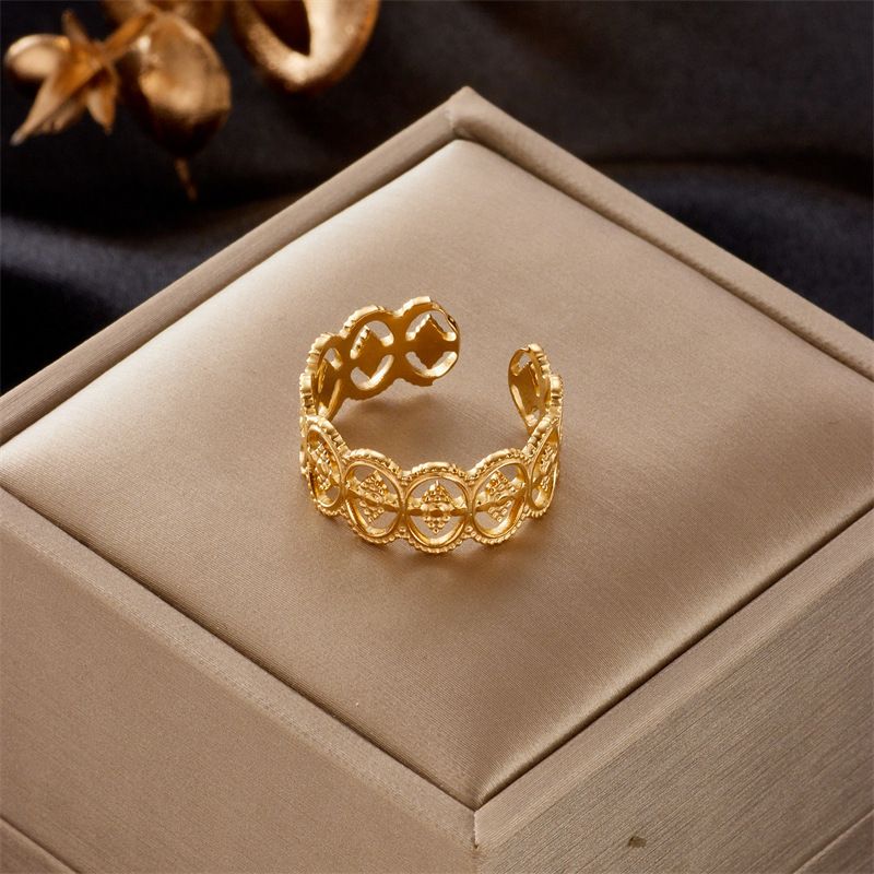 European and American fashion niche design oval diamond hollow titanium steel open ring retro high-end cold style ring_voghion.com