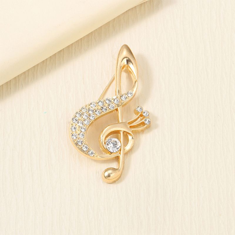Niche Design Music Note Brooch High Sense Light Luxury Alloy Brooch Fashion Versatile Anti-light Buckle Clothing Accessories_voghion.com