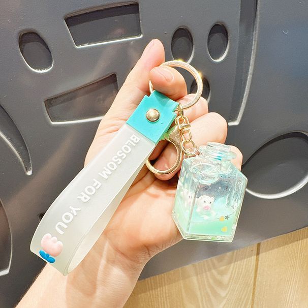 Portachiavi creativo per coppia di studenti, piccolo ciondolo a forma di bottiglia di Coca-Cola liquida riempita d'olio_voghion.com