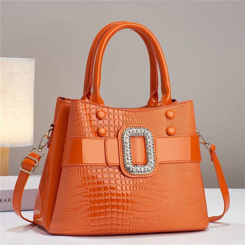 Borsa a mano da donna, semplice, super capiente, a secchiello, alla moda, a mano, a tracolla e a spalla_voghion.com