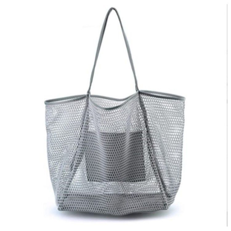 2024 New Beach Bag Leisure Large Capacity Small Hole Shape Beach Bag Women's Crossbody One Shoulder Handbag Fashionable Summer Bag_voghion.com