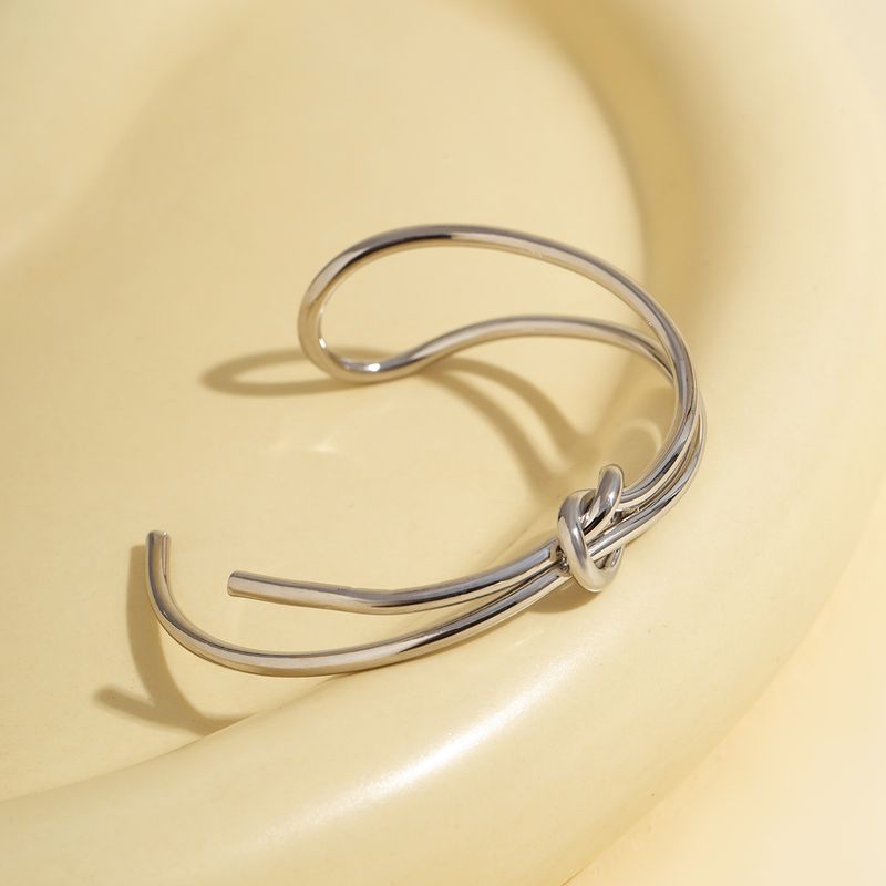 Bracciale aperto con nodo cavo impilabile, stile freddo, geometrico, in metallo, stile europeo e americano, con anello semplice, transfrontaliero._voghion.com