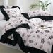 Home Textile Chemical Fiber Floral Black Ruffled Quilt Cover Three Piece Set_voghion.com