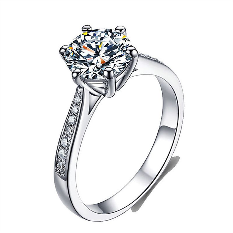 Version coréenne de la simulation de zirconium diamant à six griffes à la mode et élégante avec un anneau ouvert, classique de 1 carat_voghion.com