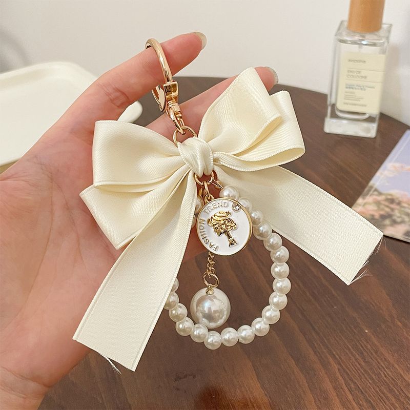 Korean version of small fragrant wind, big bow tie, pearl string, keychain, ribbon bag, pendant, handmade hair_voghion.com