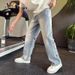 Jeans a gamba dritta effetto used da uomo | Pantaloni in denim strappati vintage dalla vestibilità comoda | Abbigliamento casual estivo da strada_voghion.com
