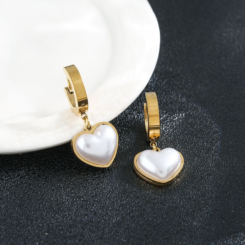 Korean temperament, high-end feeling, white mother shell, small heart earrings, female winter, small and delicate,_voghion.com