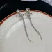 Silver Toned Star Bow Tassel Earrings CZ Accented Sparkle, Graceful Long Chains, Delicate - Dangle Style For Elegant Or_voghion.com
