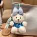 Llavero creativo con forma de oso de peluche con diseño de lazo y bloques de colores para mujer._voghion.com