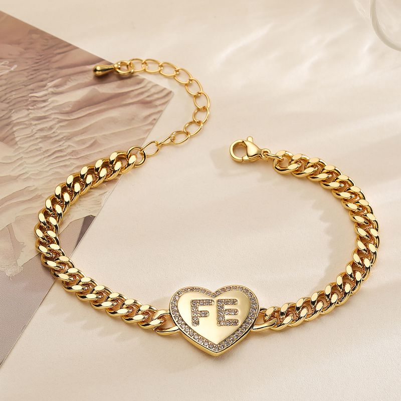 Bracciale con ciondolo a forma di cuore in zircone placcato oro e rame di Aogu, per donna, versatile, con catena cubana._voghion.com