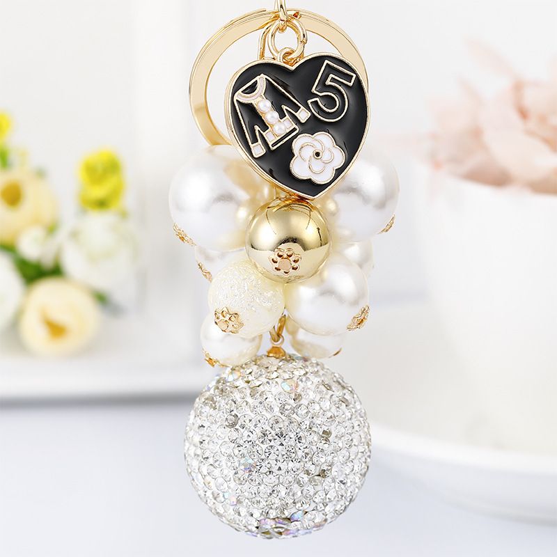 Exquisite diamond studded round pearl string small fragrance keychain clothes 5-character metal decoration bag pendant_voghion.com
