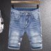 Schlichter Trend Hellblauer zerrissener Denim-Shorts für Herren Mode Vielseitige Casual Stretch-Shorts Herren Mittellange Hose_voghion.com