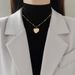 Corpo 【 Acciaio completamente in titanio 】 Collana con conchiglia d'amore, personalità minimalista nella stufa, collana in oro autentico, rete rossa femminile 【 】 Stufa, collana,_voghion.com