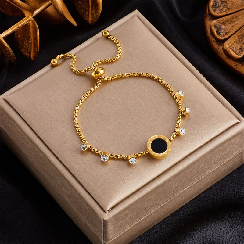 Moda Niche Design semplice con ciondolo a forma di serpente con perla d'amore incastonata di diamanti Bracciale in acciaio al titanio placcato oro_voghion.com