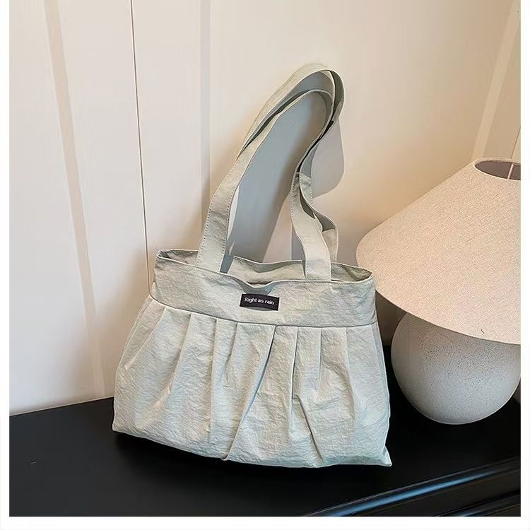 2025 Spring Shoulder Handheld Folding Sweet Lazy Wind Cloth Bag_voghion.com
