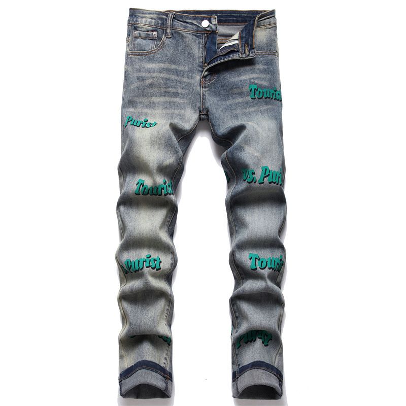 Jeans europei e americani da uomo in cotone elasticizzato sottile retrò blu piccolo dritto in pelle con stampa di fori per il commercio estero._voghion.com