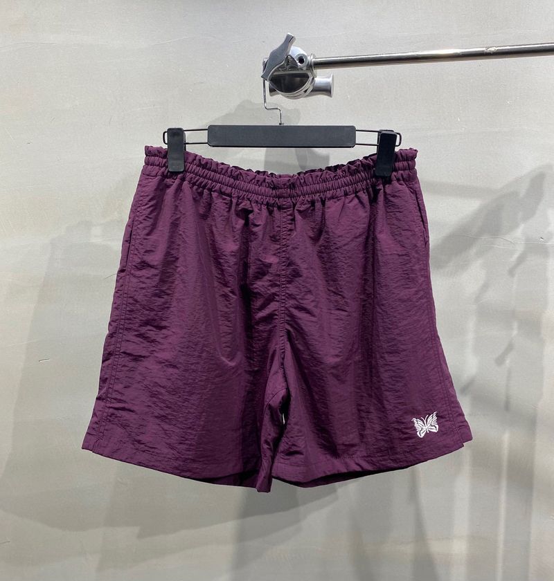 Pantaloncini da spiaggia casual larghi e ad asciugatura rapida con ricamo a farfalla da uomo_voghion.com