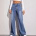 Damenbekleidung – Cat Whiskers And Maliu – Lockere Jeans mit hoher Taille und weitem Bein_voghion.com