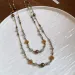 Collana con catena a doppio strato di perline di vetro a forma di fiore, adatta per maglioni retrò da donna, alta moda_voghion.com