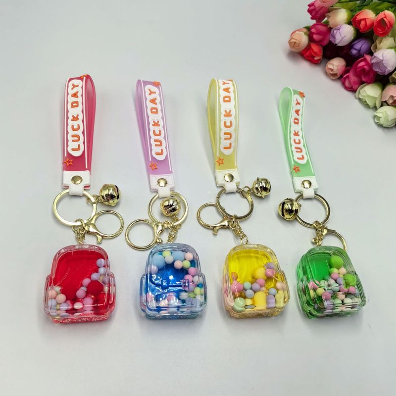 Öl-injiziert Schneeflocke Candy Bean Rucksack Schlüsselanhänger Exquisite süße Auto Tasche Anhänger kleines Geschenk_voghion.com