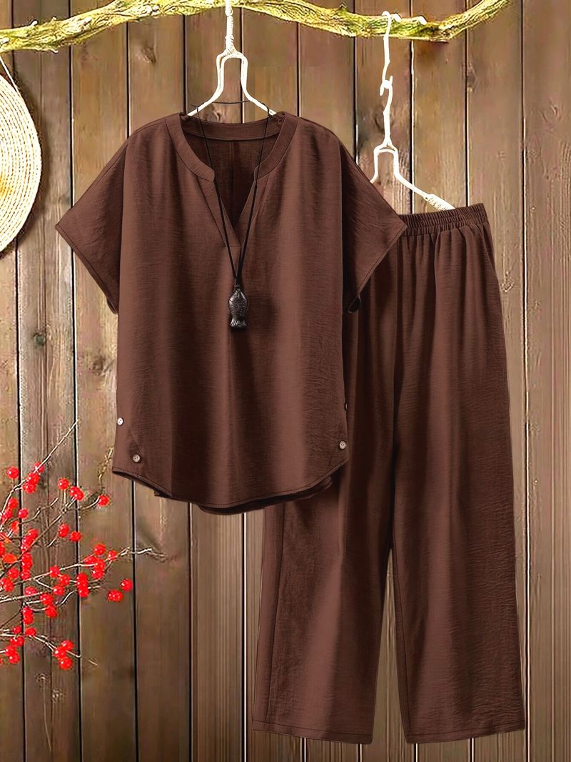 Completo da donna in due pezzi, con top e pantaloni a maniche corte, tinta unita_voghion.com