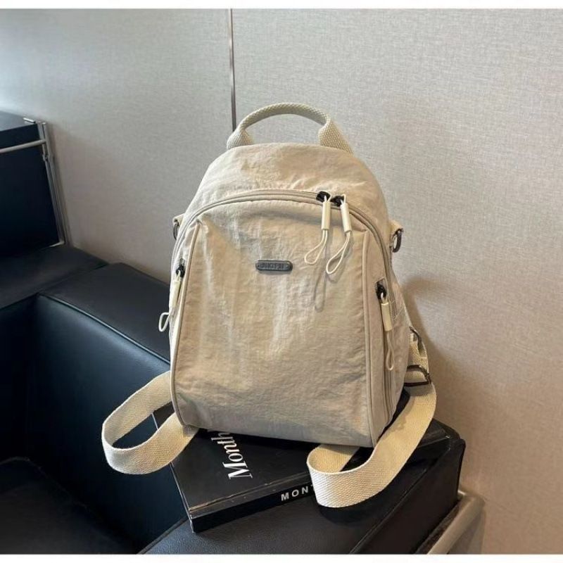 2025 Frühjahr und Sommer Neue Pendler-Modehandtaschen mit großem Fassungsvermögen, leichte kleine Rucksäcke aus Oxford-Stoff für Damen_voghion.com