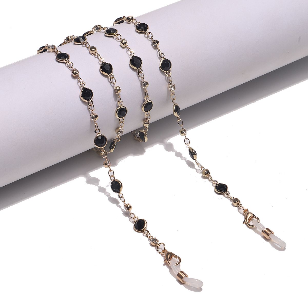 Catena per occhiali con mascherina in strass in vetro nero e oro semplice e alla moda_voghion.com