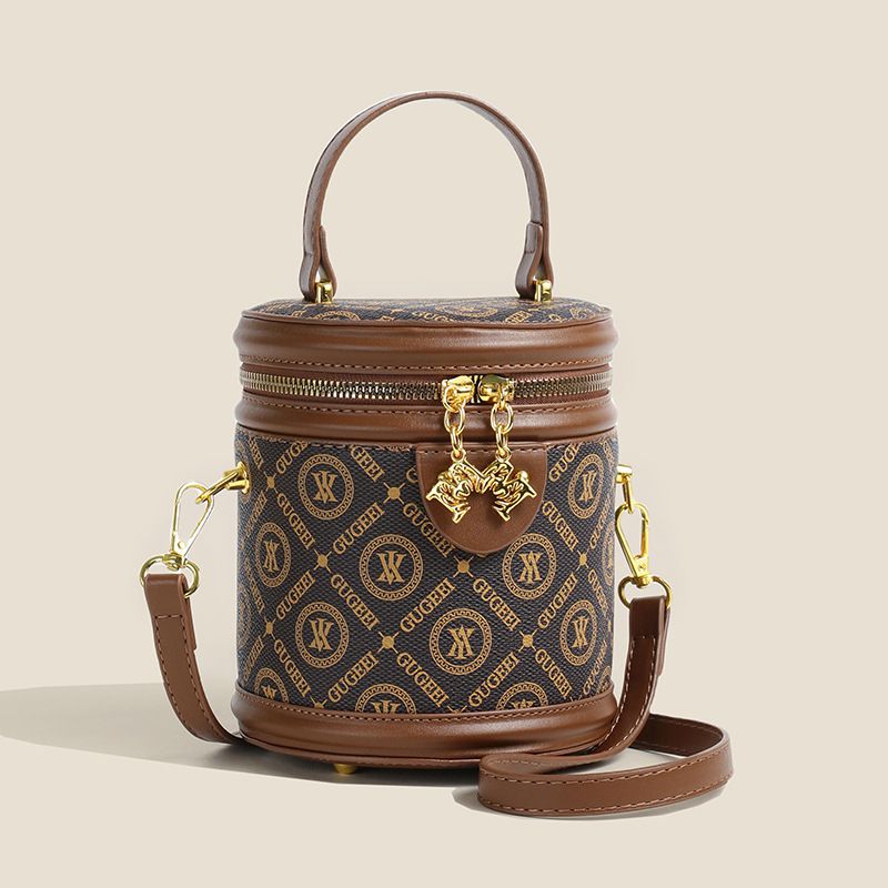 Color blocked bucket for women 2024 new niche design, hand-held cylindrical bag, trendy and textured single shoulder_voghion.com