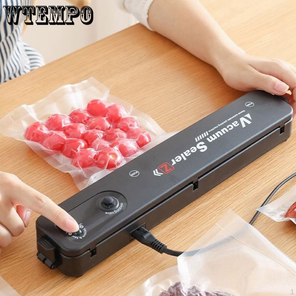 Macchina automatica per il confezionamento sottovuoto di alimenti in magazzino_voghion.com