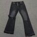 "Men's Retro Flared Jeans – AFR-Inspired Washed Black | Ink Splatter & Cat Whisker Details | Destroyed Texture & Stacked Hem"_voghion.com