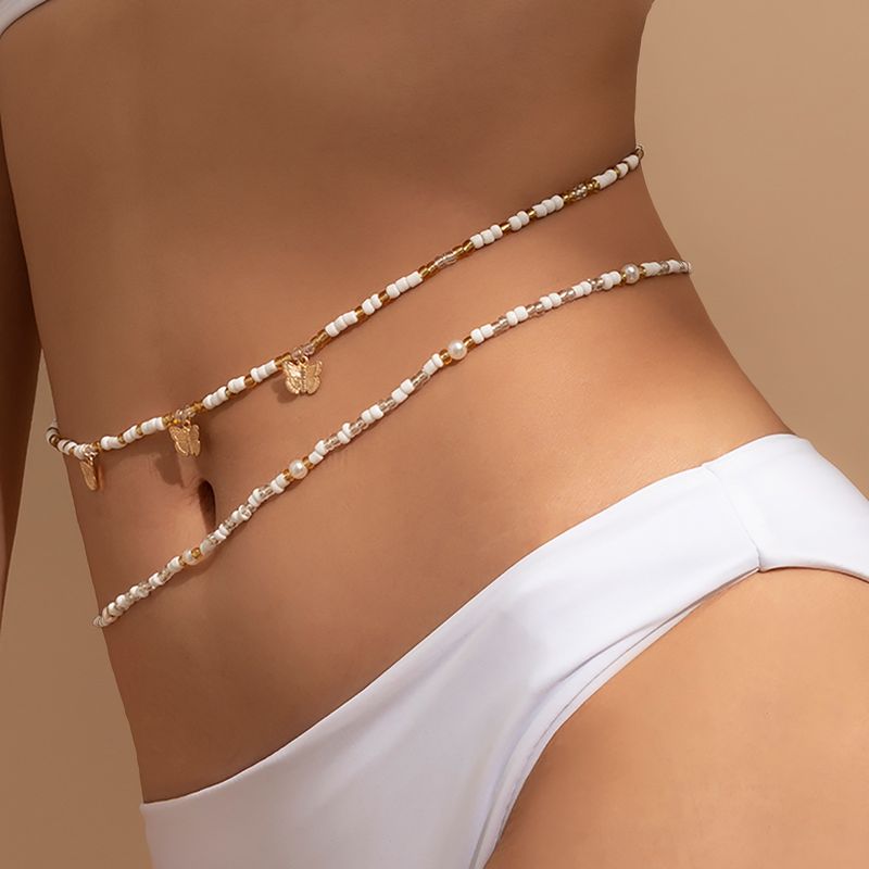 Cadena de cintura con borlas de mariposa y cuentas de arroz coloridas para la playa, conjunto elástico simple, cadena corporal con cuentas, joyería_voghion.com