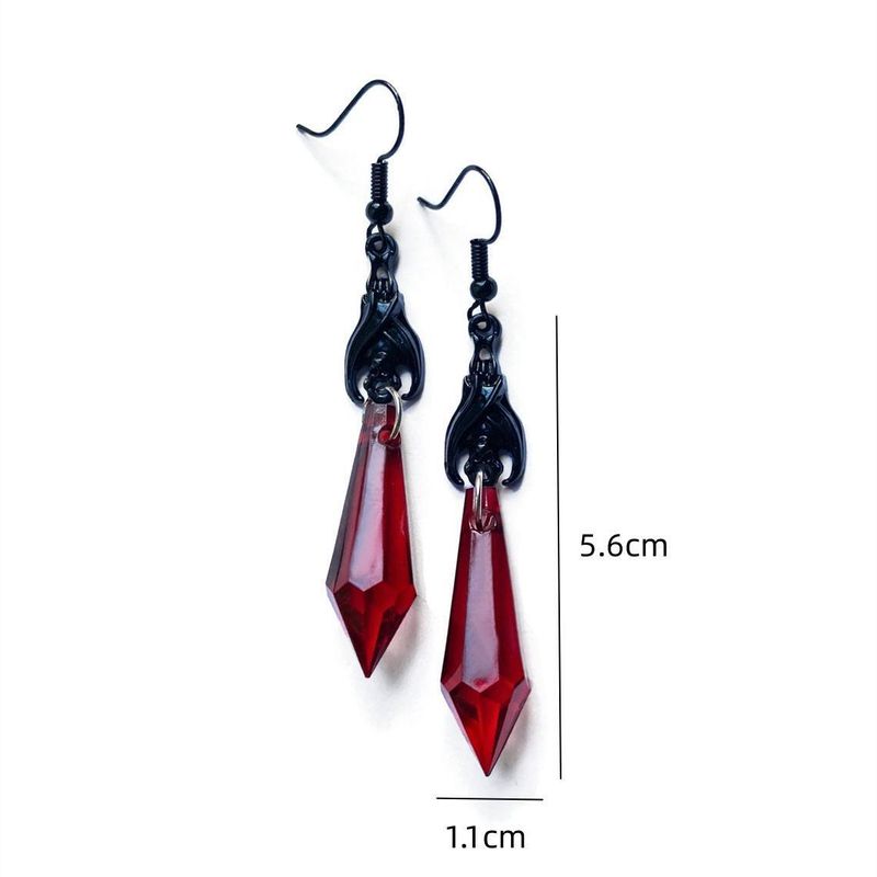Orecchini gotici a forma di pipistrello nero con goccia rossa_voghion.com