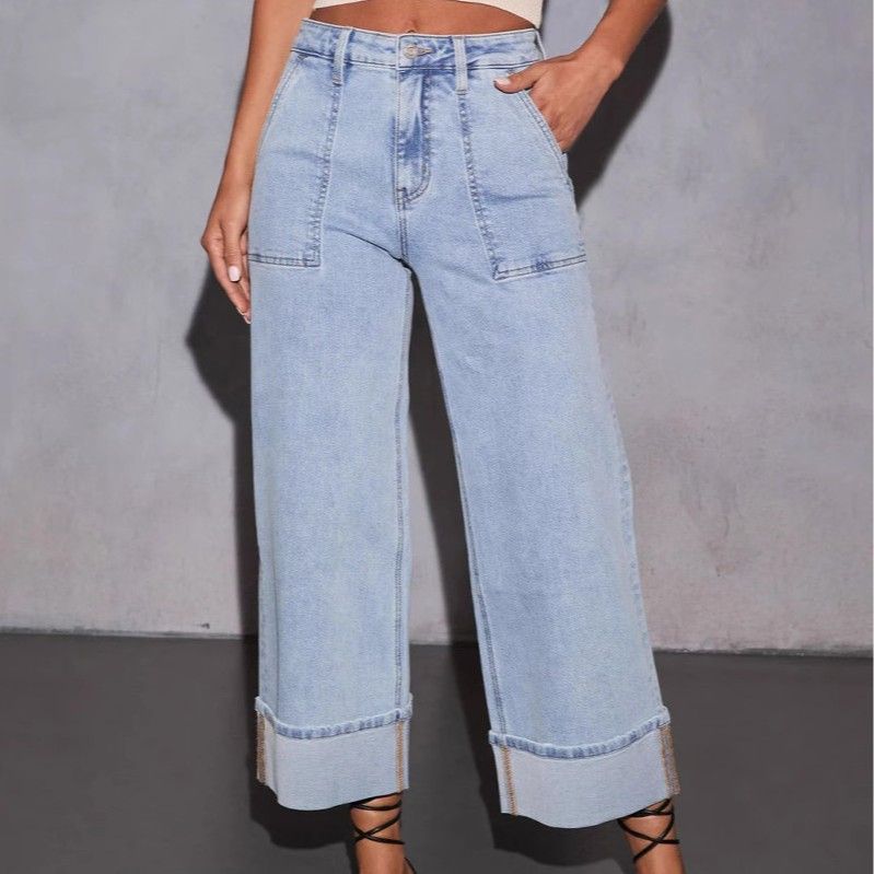 Jeans elasticizzati a vita alta e gamba larga da donna: pantaloni in denim comodi ed eleganti con effetto slavato, perfetti per abbigliamento casual e da ufficio._voghion.com