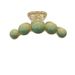 Fermaglio per capelli da donna in acrilico verde di alta qualità, con testa a sfera legata a metà e una grande clip a forma di squalo per_voghion.com