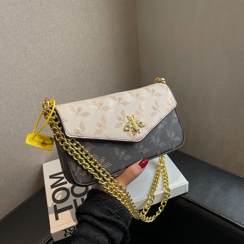 2023 nuova catena di moda singola spalla obliqua straddle piccola borsa versatile borsa a busta retrò piccola borsa quadrata marea_voghion.com
