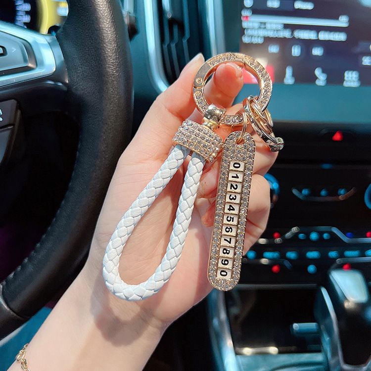 Portachiavi per auto creativo e alla moda, in pelle di alta qualità, con corda intrecciata a mano, con punta forata, dispositivo anti-smarrimento per targa_voghion.com