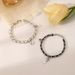 einfache Nischendesign Persönlichkeit Neue Liebesschloss Schlüssel Schwarz und Weiß mit Paar Lederseil Armband_voghion.com