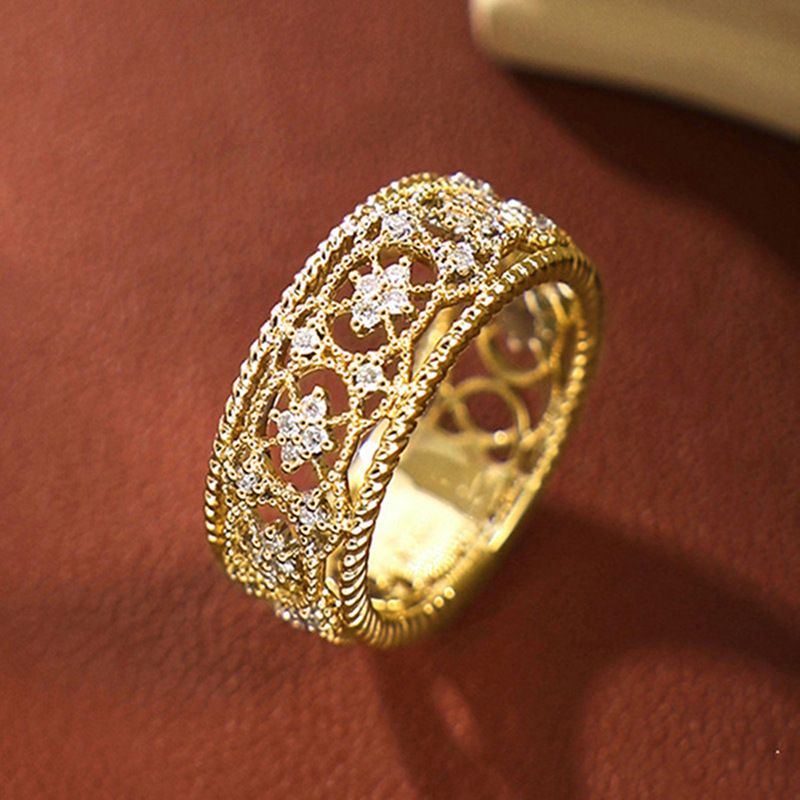 Cao Shis neuer italienischer Ring aus geflochtenem Gold mit hohlem Muster im Palaststil_voghion.com