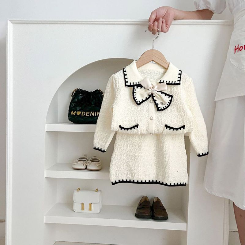 Vêtements pour enfants Vêtements pour enfants 2024 automne et hiver nouveau style petite fille manteau à nœud doux jupe cardigan en tricot pour enfants_voghion.com