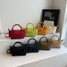 2024 new versatile niche dumpling , women's western-style work commuting hand, high-end single shoulder crossbody_voghion.com