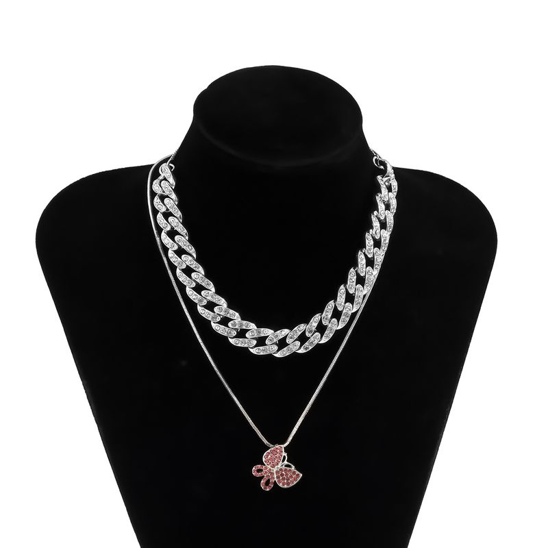 Collana con catena a serpente cubana semplice con clavicola in oro rosa e farfalla_voghion.com
