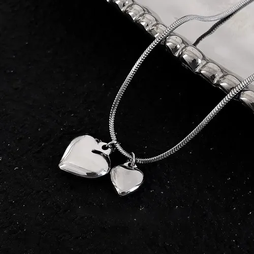 Simple high grade titanium steel heart necklace adjustable female niche design clavicle chain net red ins style sweater T chain_voghion.com