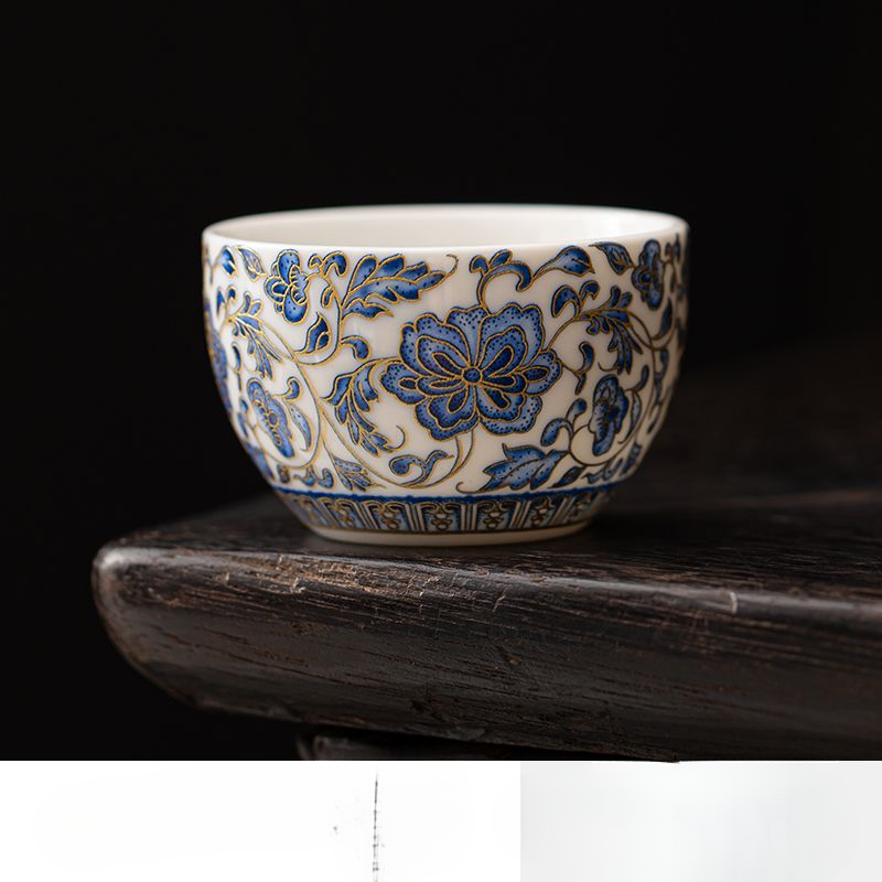 Taza de té individual de porcelana azul y blanca con diseño de loto entrelazado de lujo ligero de alta gama chino de jade Yangzhi_voghion.com