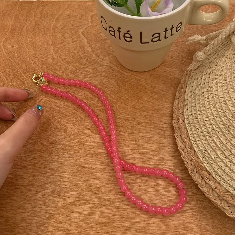 Collana di perle di vetro rosa per donna 2024 nuovo stile caldo perline colorate design di nicchia semplice collana di gioielli all'ingrosso_voghion.com