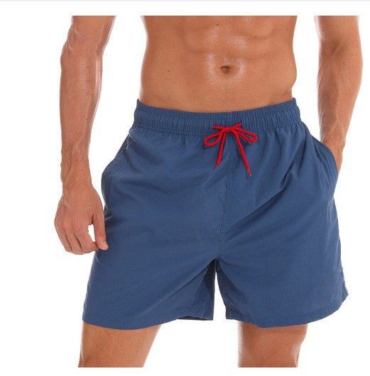 Cross-border new summer sports leisure solid color men's four-quarter shorts breathable lotus leaf style 3D men's beach pants_voghion.com