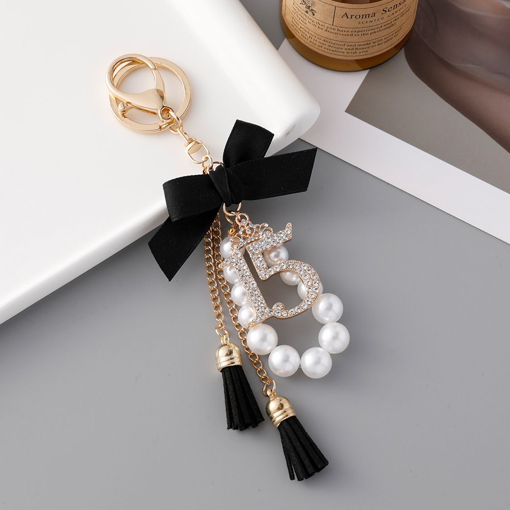 Korejiešu versija izsmalcināta radoša pērļu virtene ar 15 lociņu pušķu atslēgu piekariņu moderna rokām darināta soma kulons dāvana_voghion.com