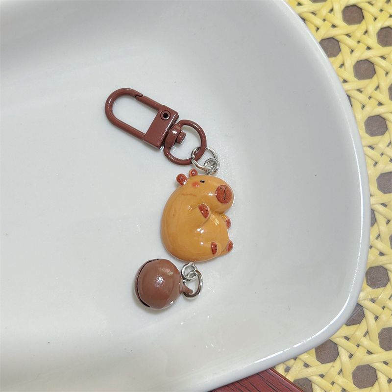 Porte-clés mignon en forme de clochette Capybara, pendentif décoratif pour sac à dos d'étudiant, accessoire cadeau pour meilleure amie_voghion.com