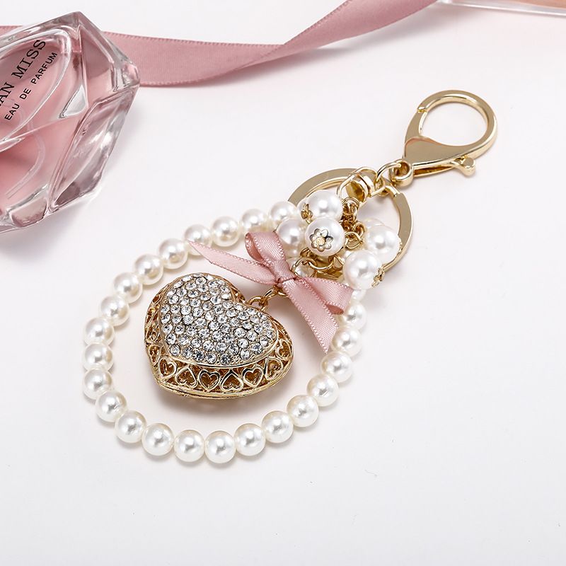 Korean Fashion New Exquisite geformte Schlüsselanhänger voller Diamant Pfirsich Herz Perle Mädchen Tasche Anhänger_voghion.com